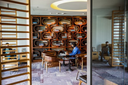 Residents of the 100 Van Ness apartments in San Francisco work in the common space of the building, the largest office-to-housing conversion in the city. Office building vacancies have increased as more companies allow their employees to work from home permanently.